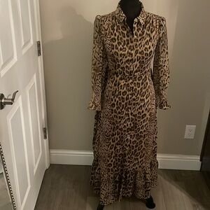 Leopard Print Dress lined. 3/4 sleeves with ruffles at sleeves & at skirt bottom